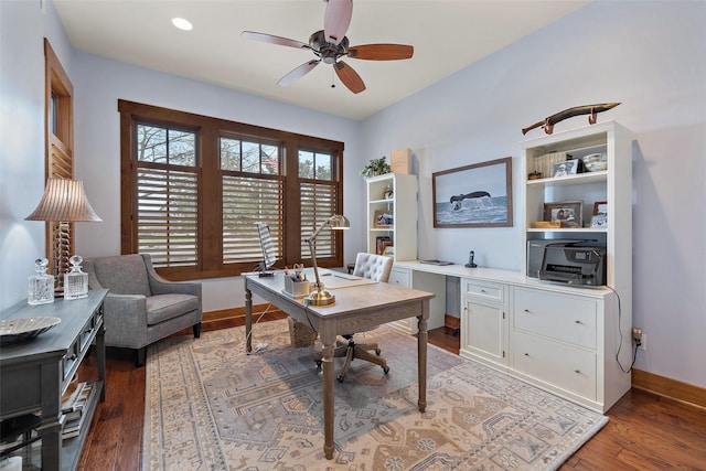 office space featuring hardwood / wood-style flooring, ceiling fan, and a wealth of natural light