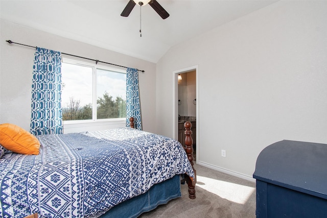 bedroom with vaulted ceiling, ceiling fan, and carpet flooring