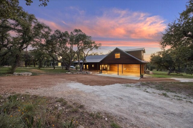 view of front of home with a carport