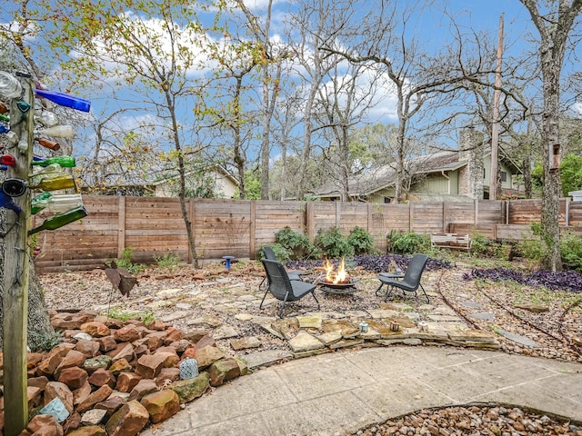 view of patio featuring an outdoor fire pit