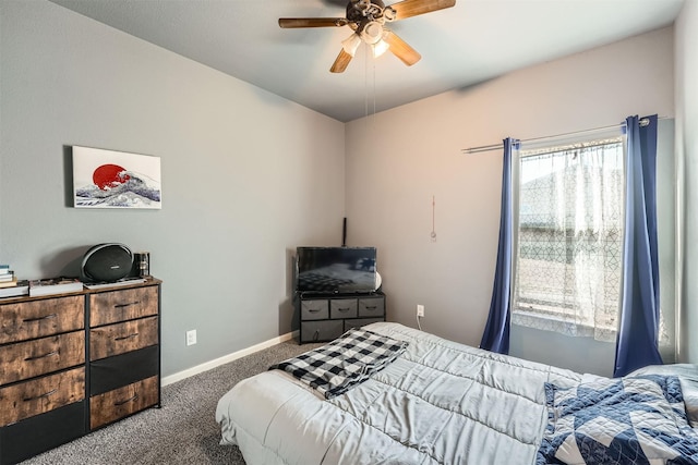 bedroom featuring dark carpet and ceiling fan