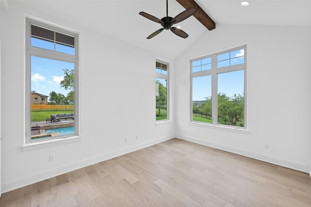 unfurnished room featuring lofted ceiling with beams, light wood-type flooring, and ceiling fan