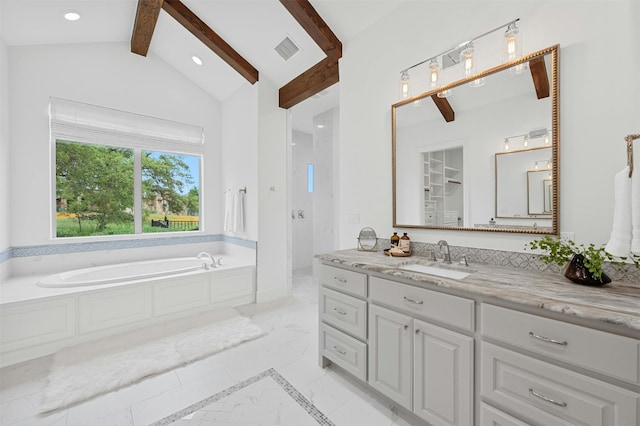 bathroom with shower with separate bathtub, vanity, and vaulted ceiling with beams