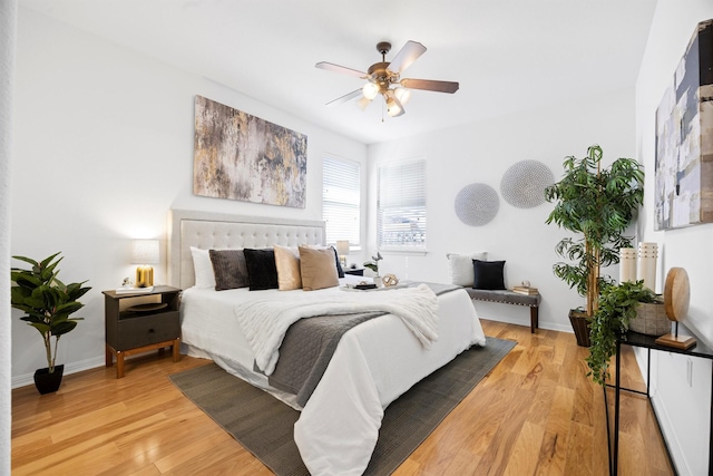 bedroom featuring ceiling fan and light wood-type flooring