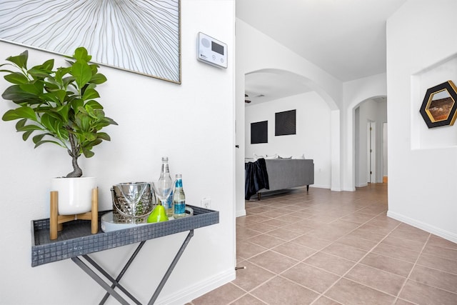 hall featuring tile patterned floors