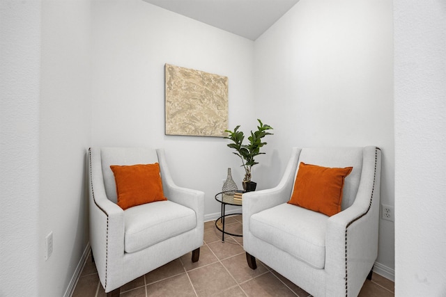 living area featuring tile patterned floors