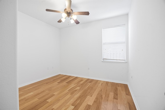 unfurnished room featuring ceiling fan and light hardwood / wood-style floors