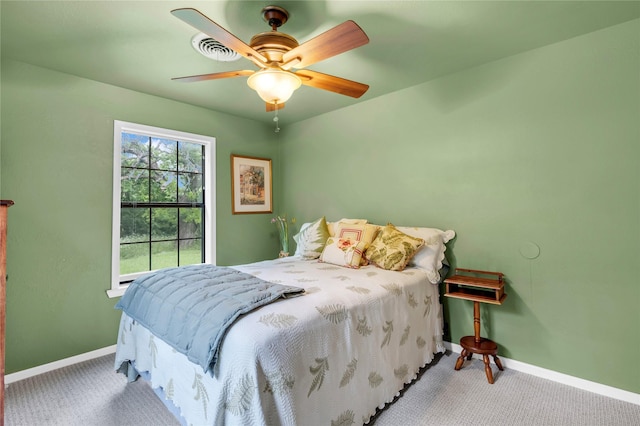 bedroom with ceiling fan and carpet flooring