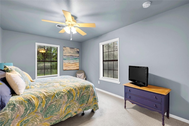 bedroom with carpet floors and ceiling fan