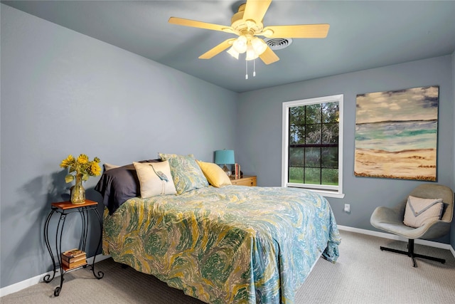 bedroom with ceiling fan and carpet flooring