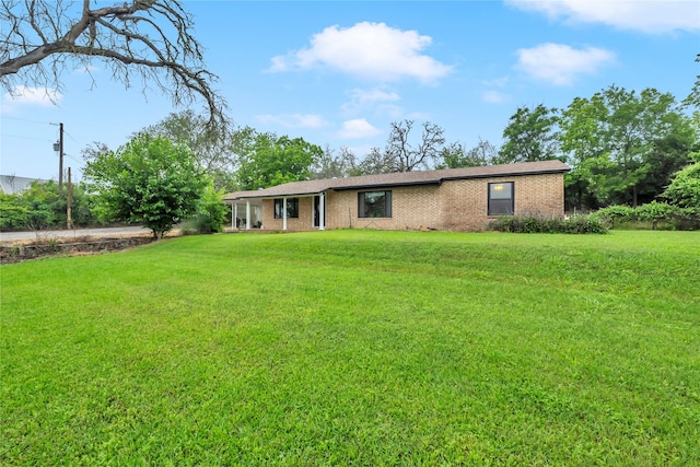 view of front of home with a front yard