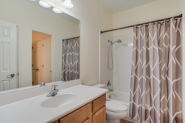 full bathroom featuring shower / bath combo, toilet, and vanity