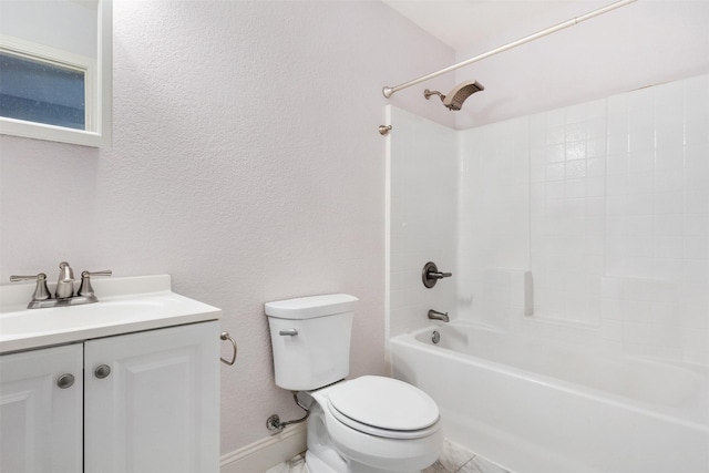 full bathroom with toilet, vanity, and  shower combination