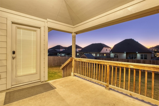 view of patio terrace at dusk