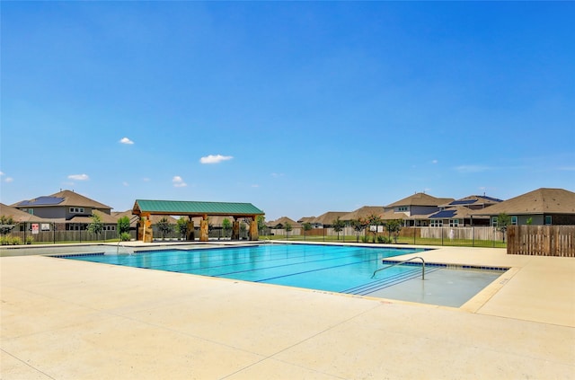 view of pool featuring a gazebo and a patio