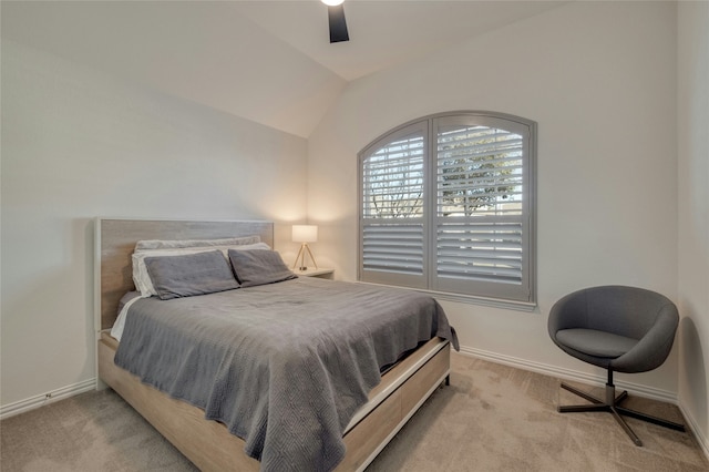 bedroom featuring ceiling fan, light colored carpet, and lofted ceiling