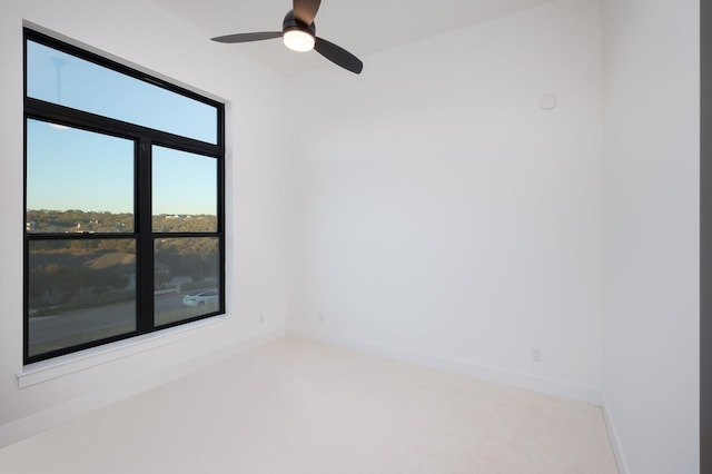 spare room with ceiling fan