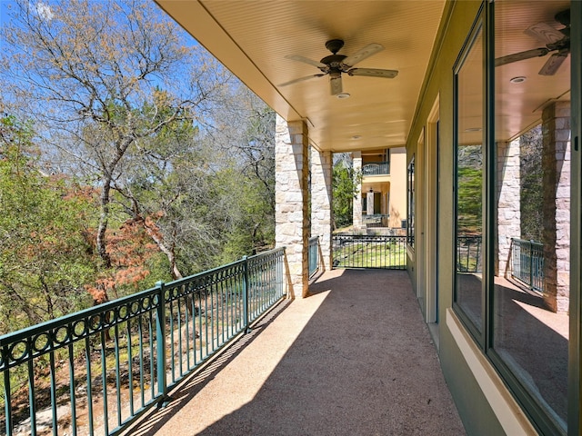 balcony featuring ceiling fan