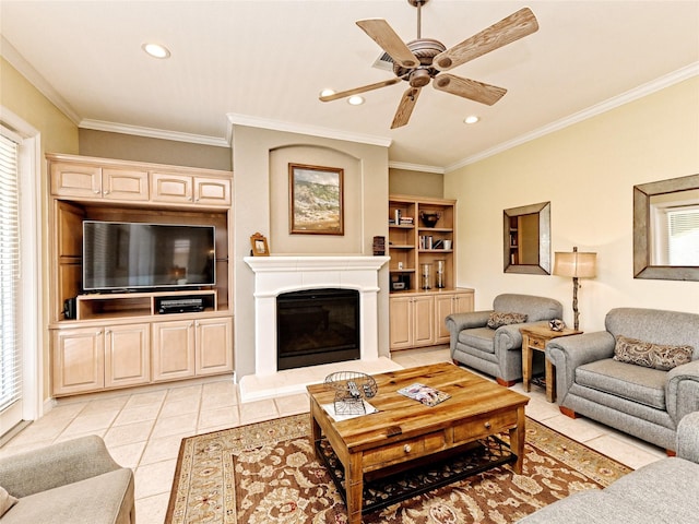 tiled living room featuring ornamental molding and ceiling fan