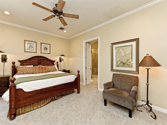 carpeted bedroom featuring connected bathroom, ceiling fan, and ornamental molding