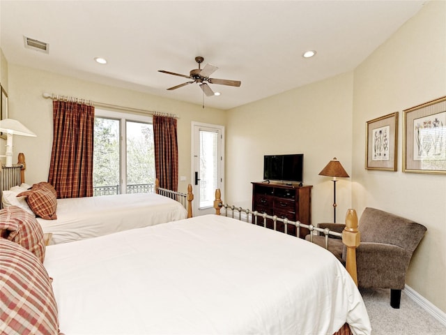 carpeted bedroom featuring ceiling fan