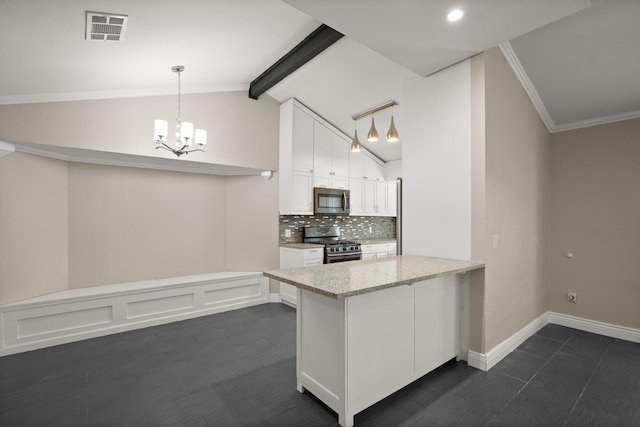 kitchen with kitchen peninsula, decorative light fixtures, white cabinets, appliances with stainless steel finishes, and vaulted ceiling with beams