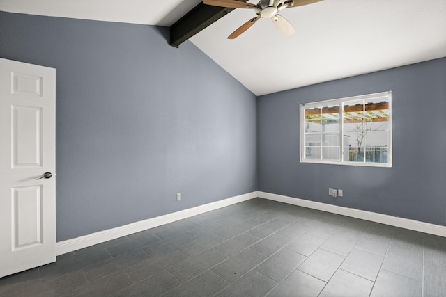 empty room featuring ceiling fan and lofted ceiling with beams