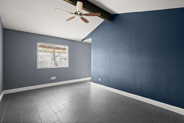 empty room with ceiling fan and lofted ceiling with beams