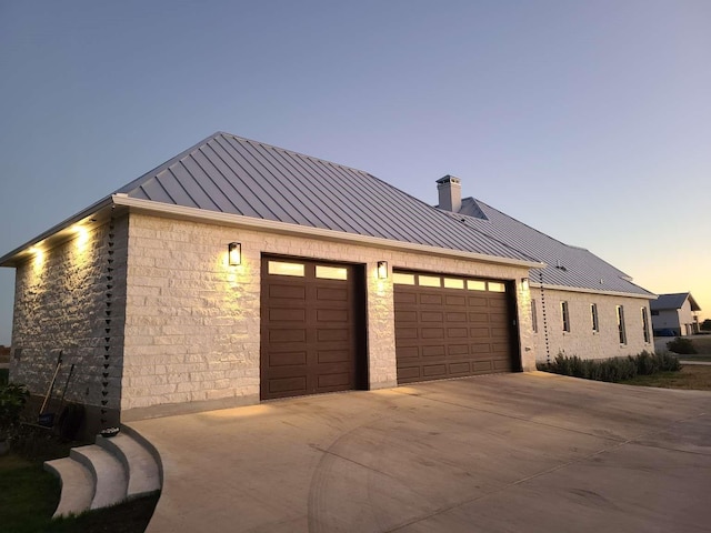 exterior space with a garage