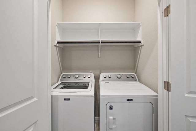 laundry area with washer and clothes dryer