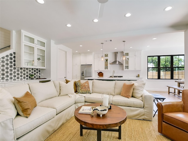 living room featuring sink