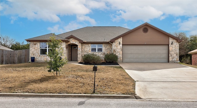 single story home featuring a garage