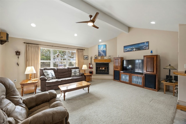 living room with ceiling fan, carpet floors, and lofted ceiling with beams