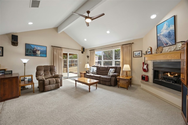 living room featuring vaulted ceiling with beams, ceiling fan, and carpet flooring