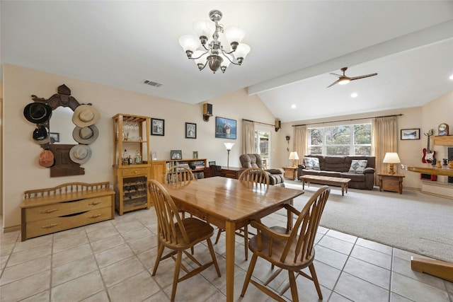 1505 E Johnson St, Burnet, TX 78611 - dining room with light tile patterned flooring, a chandelier, light carpet, and ceiling fan