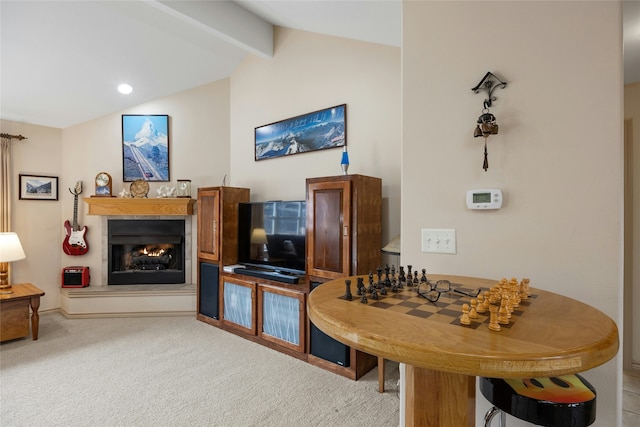 interior space with vaulted ceiling with beams