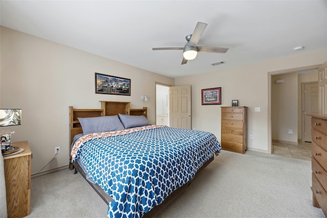 bedroom featuring light carpet and ceiling fan