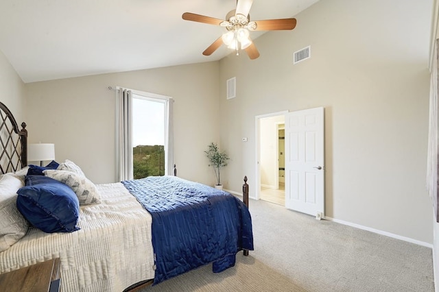 bedroom with high vaulted ceiling, carpet floors, and ceiling fan