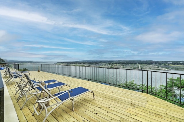 deck featuring a water view