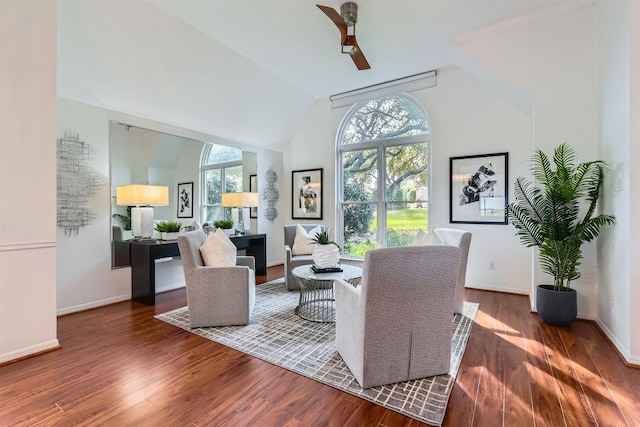 living room with ceiling fan, lofted ceiling, and dark hardwood / wood-style floors