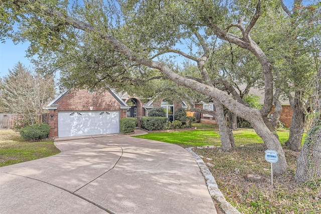 view of front of house with a front lawn and a garage