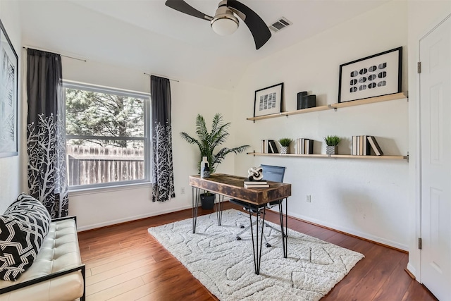 office area featuring lofted ceiling and dark wood-type flooring