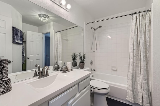 full bathroom with toilet, vanity, and shower / bath combination with curtain