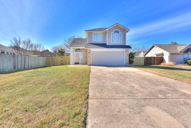 front of property featuring a garage and a front lawn