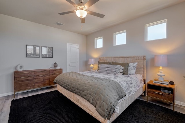 bedroom featuring ceiling fan and hardwood / wood-style floors