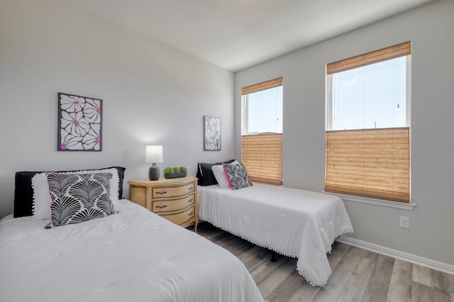 bedroom featuring hardwood / wood-style flooring