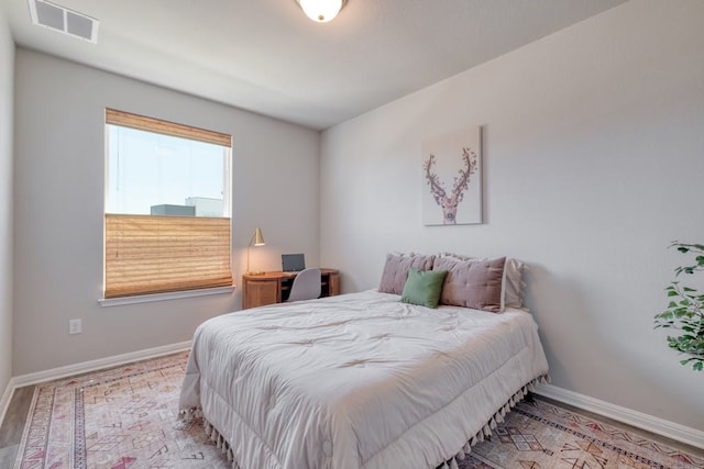 bedroom featuring light hardwood / wood-style floors