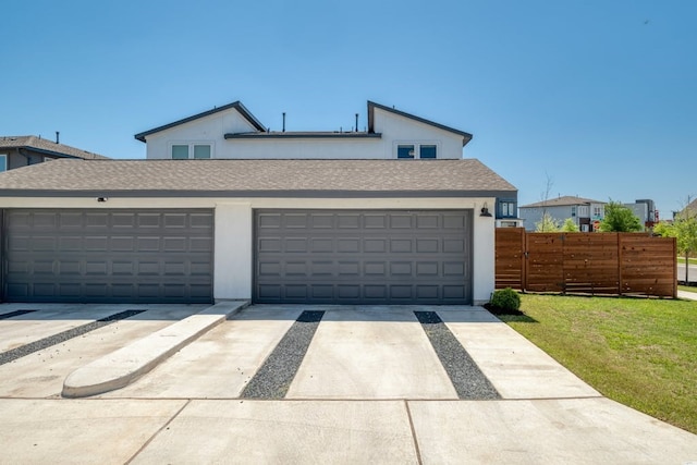 garage with a lawn