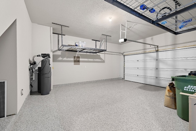 2213 Rocoso Trl, Leander, TX 78641 - garage featuring a garage door opener
