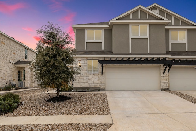 view of front of home with a garage